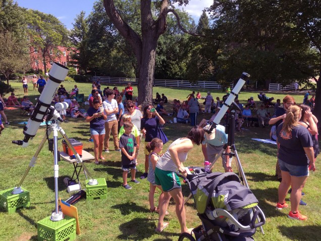 Photo: People Watching and Waiting for the Big Event - Credit: James Guilford